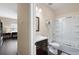 Bathroom with vanity, combination shower and tub, and a view of another room at 4421 Wooded Oaks Nw, Kennesaw, GA 30152