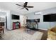 Bright home office area with wood floors, dual monitors, ceiling fan and access to the bathroom at 4421 Wooded Oaks Nw, Kennesaw, GA 30152