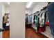 Spacious walk-in closet with custom shelving and ample storage for your wardrobe at 4421 Wooded Oaks Nw, Kennesaw, GA 30152
