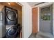 Convenient laundry area featuring a stacked washer and dryer unit at 573 Lyle Se Dr, Marietta, GA 30067