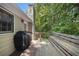 The beautiful back deck is perfect for grilling and relaxation, surrounded by lush greenery at 258 Cristy Dr, Dallas, GA 30157