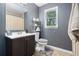 Small bathroom with gray walls, decorative shower curtain, and a single vanity at 258 Cristy Dr, Dallas, GA 30157