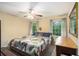 Bright bedroom with neutral walls, ceiling fan, and two windows offering natural light at 258 Cristy Dr, Dallas, GA 30157