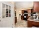 Functional kitchen with dark wood cabinets and modern appliances at 258 Cristy Dr, Dallas, GA 30157
