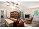 Inviting living room with a stone fireplace, plush seating, and decorative built-in shelving at 258 Cristy Dr, Dallas, GA 30157