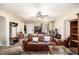 Spacious living room featuring a comfortable sofa, workspace, and open layout at 258 Cristy Dr, Dallas, GA 30157