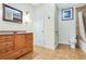 Bathroom featuring stylish vanity, tiled floor, and shower-tub combination at 3570 Bulloch Lake Rd, Loganville, GA 30052