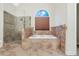 Elegant bathroom featuring a luxurious soaking tub and glass shower at 3570 Bulloch Lake Rd, Loganville, GA 30052