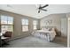 Comfortable bedroom with large windows providing natural light and a vaulted ceiling at 4974 Whiteoak Walk Se # 21, Smyrna, GA 30080