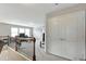 Bright upstairs hallway with a closet and railing overlooking the main living space at 4974 Whiteoak Walk Se # 21, Smyrna, GA 30080