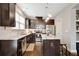 Modern kitchen with stainless steel appliances and a view of the center island at 4974 Whiteoak Walk Se # 21, Smyrna, GA 30080