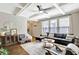 Comfortable living room featuring a coffered ceiling, hardwood floors, and an abundance of natural light at 4974 Whiteoak Walk Se # 21, Smyrna, GA 30080
