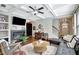 Relaxing living room boasts coffered ceilings, a fireplace, and seamless access to the entry hallway at 4974 Whiteoak Walk Se # 21, Smyrna, GA 30080