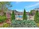 Community pool area with mature landscaping at 4974 Whiteoak Walk Se # 21, Smyrna, GA 30080
