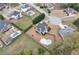 Aerial view of home featuring a pool, lush trees, and an expansive yard at 52 Weatherstone Way, Dallas, GA 30157