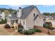 Back exterior featuring a new deck with stairs to the ground and a screened in porch at 52 Weatherstone Way, Dallas, GA 30157