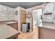 Basement bar offers a mini fridge and convenient access to a bathroom, perfect for entertaining at 52 Weatherstone Way, Dallas, GA 30157