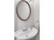 Half bathroom featuring modern sink, faucet, and mirror at 52 Weatherstone Way, Dallas, GA 30157