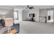 Bright bonus room featuring neutral walls, ceiling fan, recessed lighting, and gray carpeting at 52 Weatherstone Way, Dallas, GA 30157