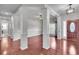 Open dining room area featuring hardwood floors and ample natural light, perfect for Gathering gatherings at 52 Weatherstone Way, Dallas, GA 30157