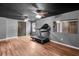 Basement exercise room with a treadmill, providing a dedicated space for fitness and wellness activities at 52 Weatherstone Way, Dallas, GA 30157