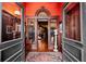 Elegant foyer showcasing intricate woodwork, an ornate archway, and a view of the staircase at 285 Kennesaw Nw Ave, Marietta, GA 30060