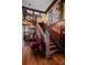 Grand foyer featuring dark wood accents, a staircase, and classic artwork at 285 Kennesaw Nw Ave, Marietta, GA 30060