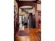 Stunning foyer featuring a grand staircase, dark wood trim, and beautiful hardwood floors at 285 Kennesaw Nw Ave, Marietta, GA 30060