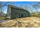 Spacious detached garage with multiple bays and ample parking space at 285 Kennesaw Nw Ave, Marietta, GA 30060
