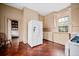 Functional kitchen with white appliances, ample cabinetry, and a charming window view at 285 Kennesaw Nw Ave, Marietta, GA 30060