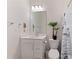 Bright bathroom with a stylish vanity, modern fixtures, and a decorative shower curtain at 3420 Reagan Way, Lawrenceville, GA 30044