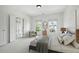 Inviting bedroom with neutral tones, comfortable seating, and bright windows, offering a relaxing retreat at 4428 Wilkerson Manor Se Dr # 6, Smyrna, GA 30080
