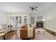 Bright living room with windows, fireplace, and transitional living spaces at 4428 Wilkerson Manor Se Dr # 6, Smyrna, GA 30080