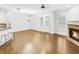 Spacious living room with a fireplace, hardwood floors, and natural light at 4428 Wilkerson Manor Se Dr # 6, Smyrna, GA 30080