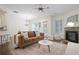 Comfortable living area with natural light, fireplace, and views of the breakfast area at 4428 Wilkerson Manor Se Dr # 6, Smyrna, GA 30080