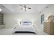 Main bedroom featuring tray ceiling, ceiling fan, and natural light at 4428 Wilkerson Manor Se Dr # 6, Smyrna, GA 30080