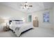 Spacious main bedroom with tray ceiling, ceiling fan, and natural light at 4428 Wilkerson Manor Se Dr # 6, Smyrna, GA 30080