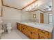 Bright bathroom featuring a double sink vanity and neutral color palette at 452 Hightower Ridge Rd, Covington, GA 30014