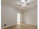 Neutral bedroom showcasing natural light and a ceiling fan at 452 Hightower Ridge Rd, Covington, GA 30014