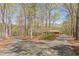 Split driveway leading to a home with mature trees at 452 Hightower Ridge Rd, Covington, GA 30014