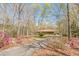 Secluded home surrounded by mature trees, offering a private and serene setting at 452 Hightower Ridge Rd, Covington, GA 30014