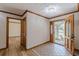 Spacious foyer with tile and wood flooring, offering access to various rooms in the home at 452 Hightower Ridge Rd, Covington, GA 30014