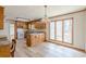 Charming kitchen with granite counters, natural wood cabinets, and bright natural light at 452 Hightower Ridge Rd, Covington, GA 30014