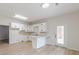 Spacious kitchen featuring an island and light countertops, ready for your personal touch at 452 Hightower Ridge Rd, Covington, GA 30014