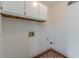 A blank canvas laundry room with mosaic flooring and utility connections is ready to be designed to your needs at 452 Hightower Ridge Rd, Covington, GA 30014