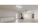 Expansive living room with hardwood floors, wood-burning stove and abundant natural light at 452 Hightower Ridge Rd, Covington, GA 30014