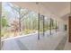 Covered patio featuring a spiral staircase, offering an outdoor retreat with access to the upper level at 452 Hightower Ridge Rd, Covington, GA 30014
