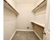 Walk-in closet with built-in shelves at 512 Clearwater Dr, Mcdonough, GA 30252