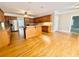 Bright and airy kitchen with wood cabinets, stainless appliances, and a center island at 512 Clearwater Dr, Mcdonough, GA 30252