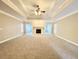 Spacious living room with fireplace, coffered ceiling, and plenty of room at 512 Clearwater Dr, Mcdonough, GA 30252